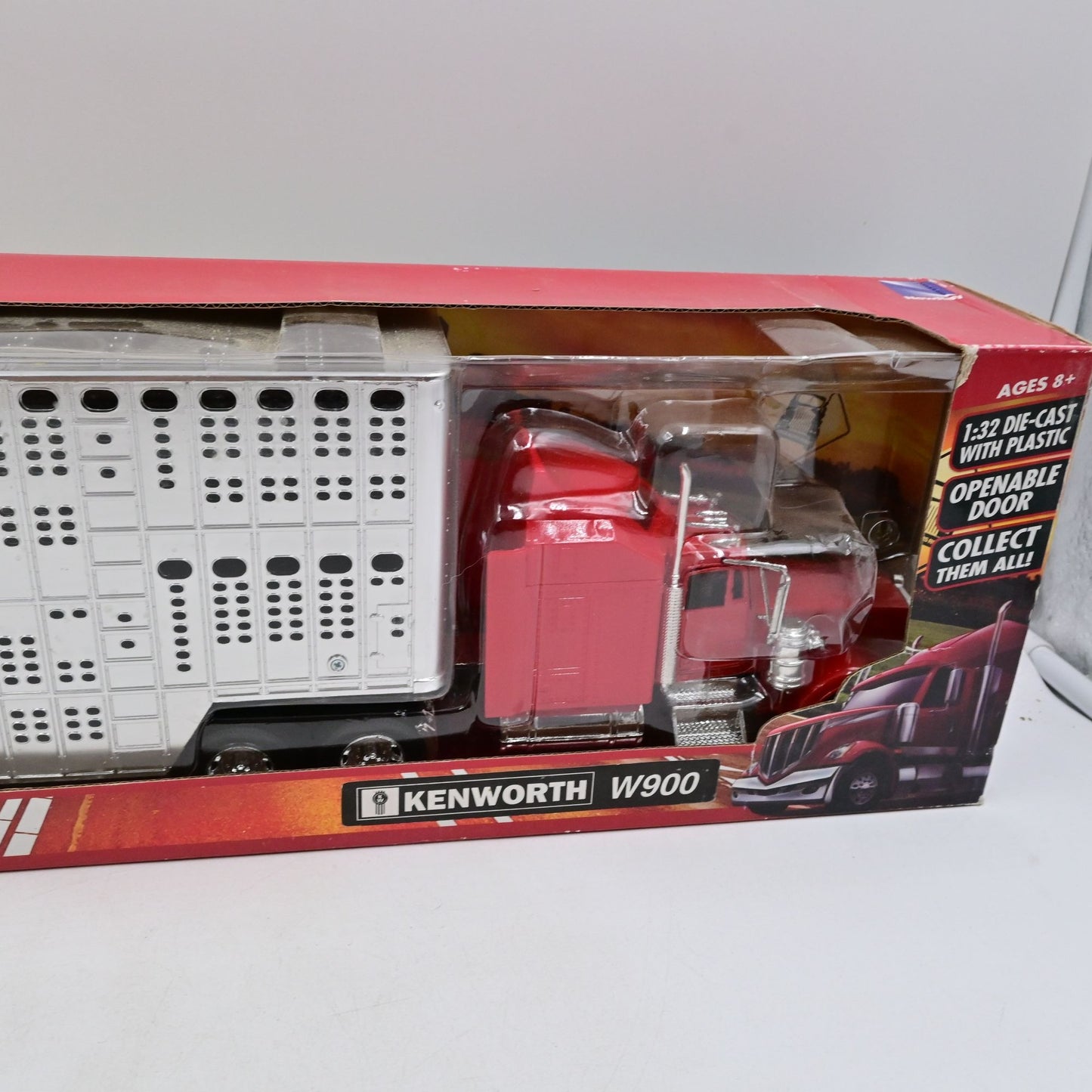 New Ray Long Haul Kenworth W900 Truck Red with Potbelly Livestock Trailer Chrome