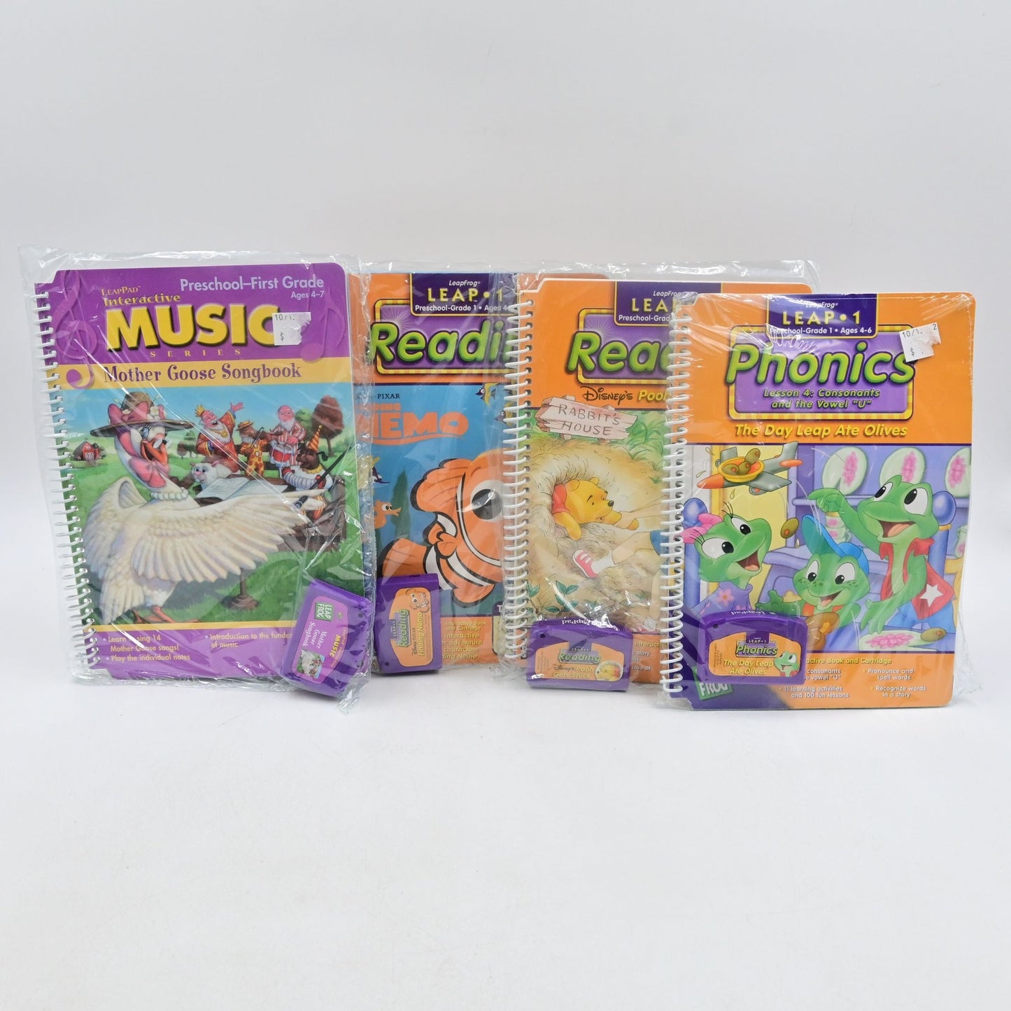 Leapfrog Leap 1 Bundle Of 4 Winnie The Pooh, Finding Nemo, Phonics, Music