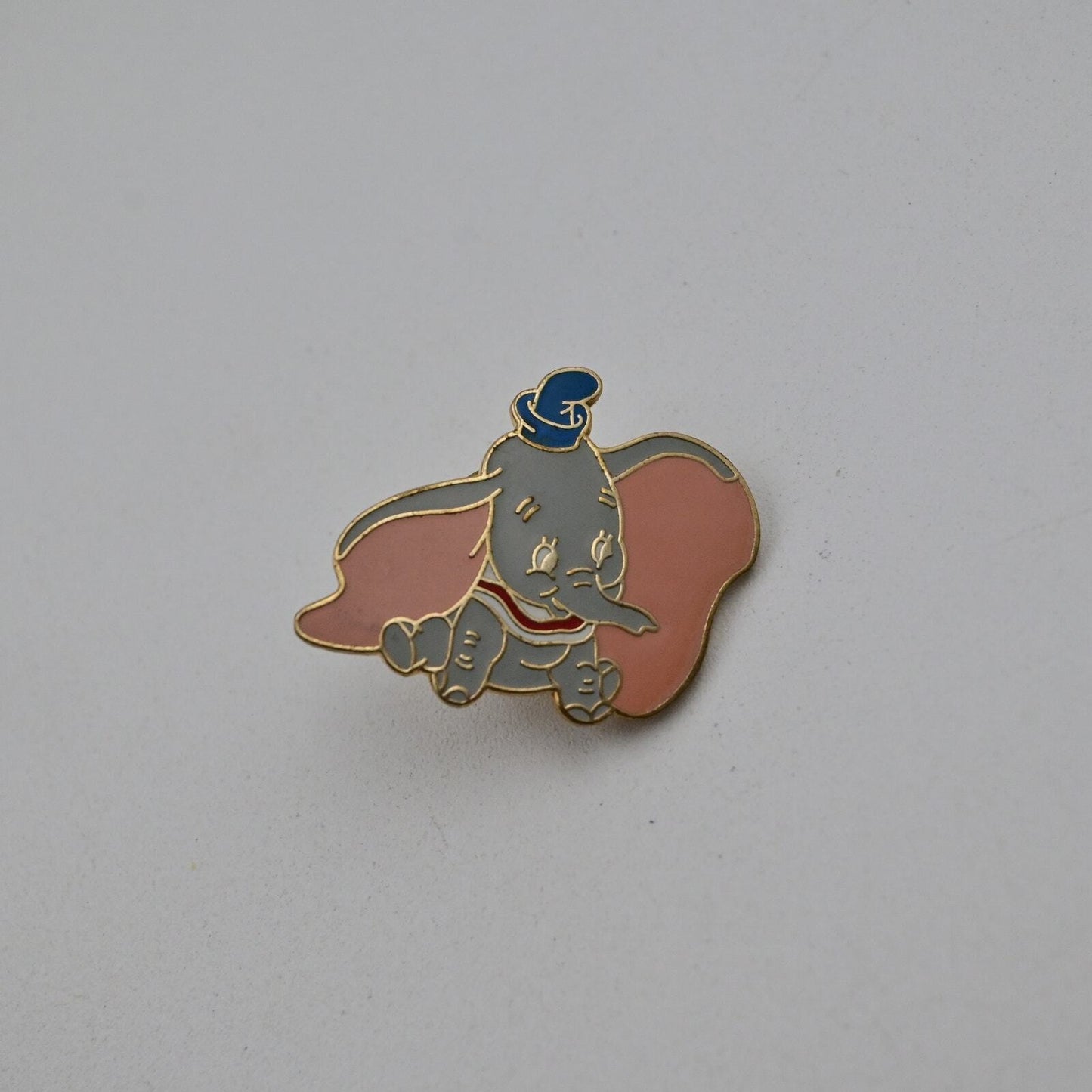 Disney Dumbo the Flying Elephant Blue Hat Sitting Trading Pin