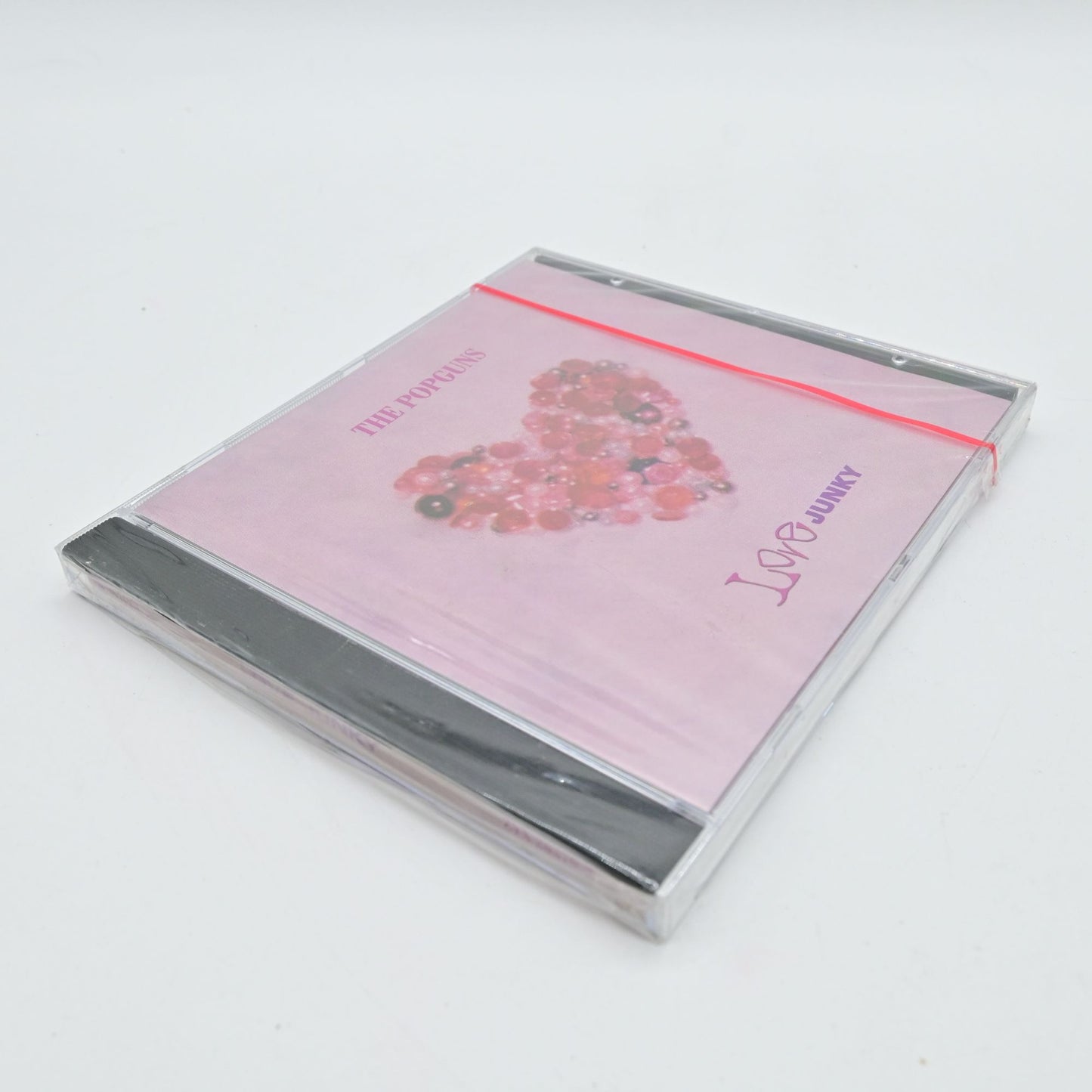 The Popguns Love Junky Cd Factory Sealed. In new condition