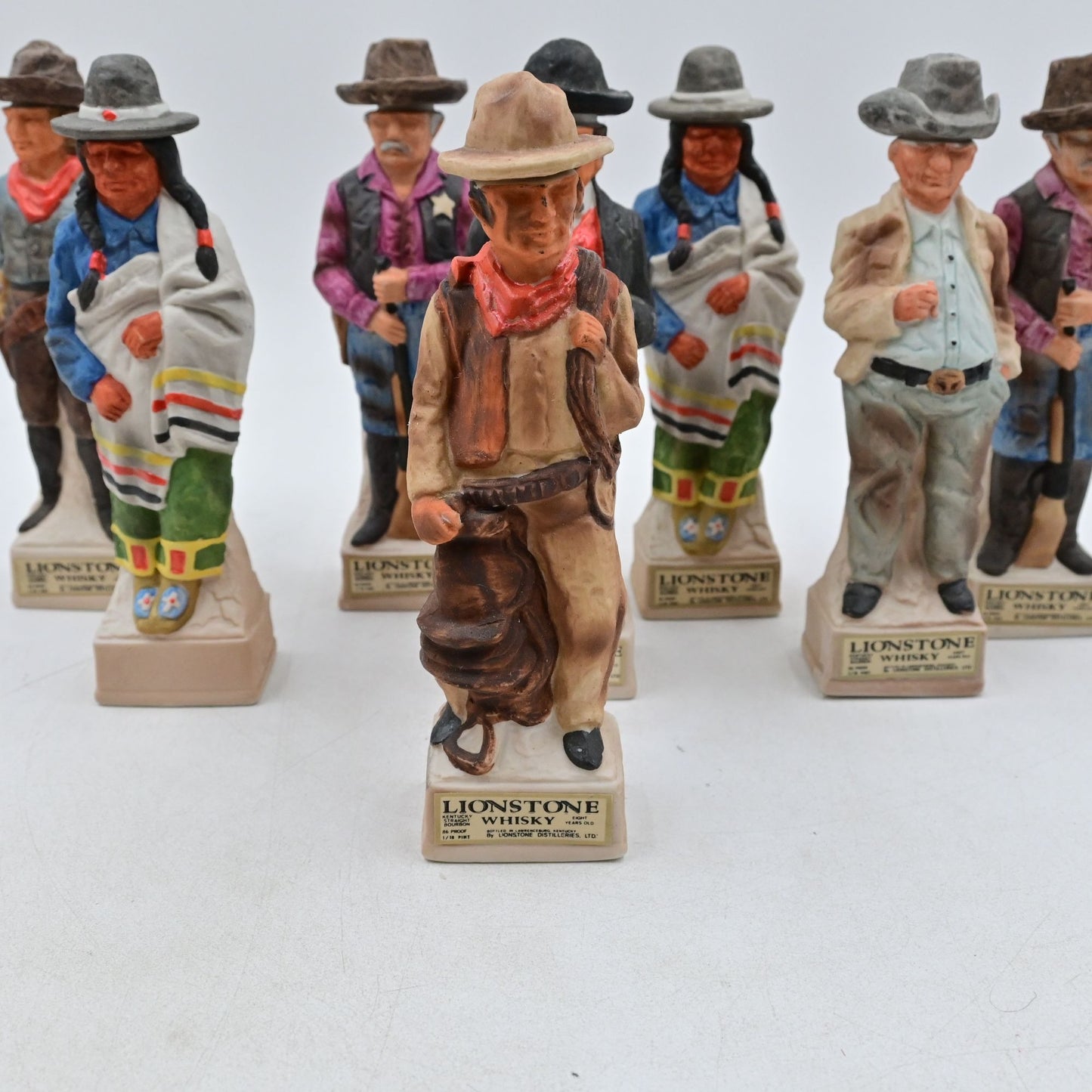 Lionstone Whisky Empty Decanter Bundle Of 8 Proud Indian, Sheriff, Cowboy, Etc