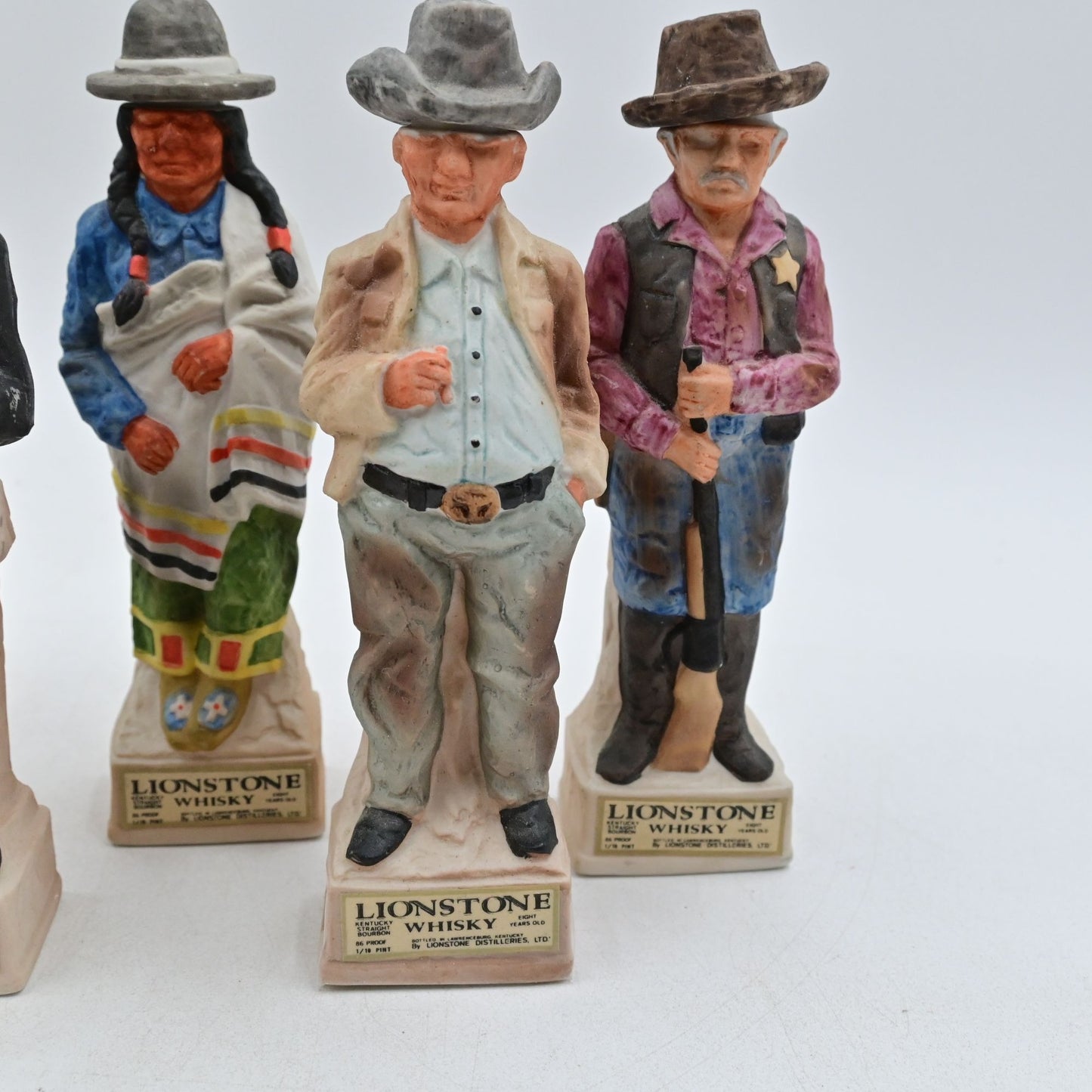 Lionstone Whisky Empty Decanter Bundle Of 8 Proud Indian, Sheriff, Cowboy, Etc