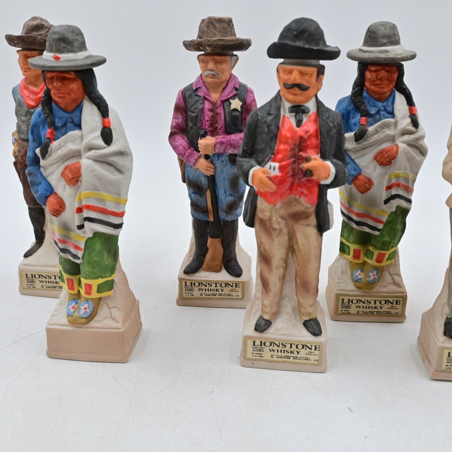Lionstone Whisky Empty Decanter Bundle Of 8 Proud Indian, Sheriff, Cowboy, Etc