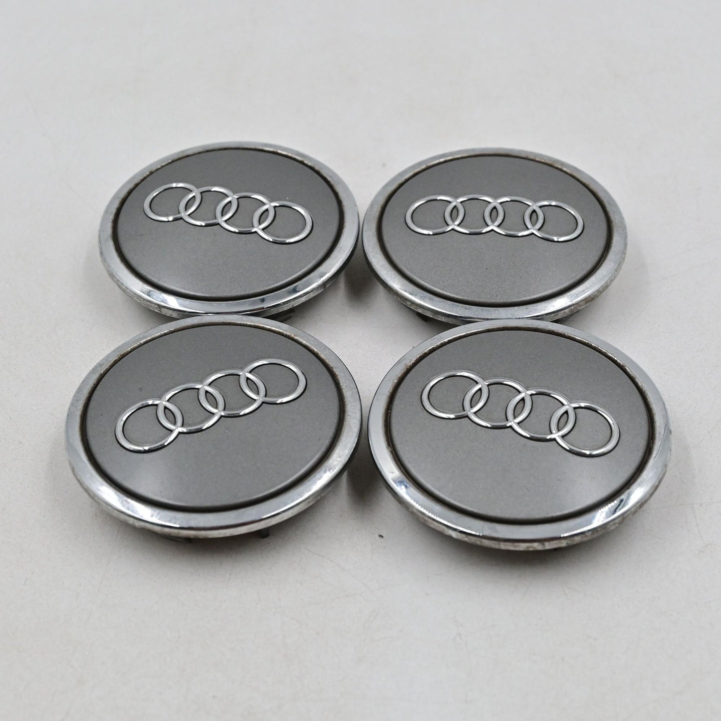 Genuine Audi OEM Grey And Chrome Wheel Center Caps Part 4BO601170A